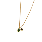 Green and black irregular necklace with irregular shapes